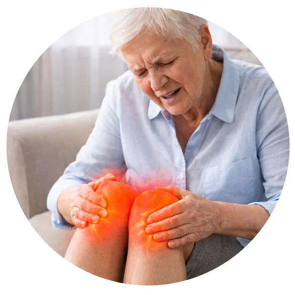 Woman holding both sore knees